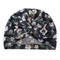 Detail of floral printed baby turban hat with a large navy blue bow in soft cotton - Dark Blue Floral (I)