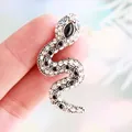 Silver-toned vintage snake brooch encrusted with sparkling white and black rhinestones - Silver with White Zirconia
