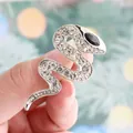 Silver-toned snake brooch fully encrusted with clear rhinestones and black eye - Silver Full Rhinestone