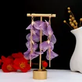 Elegant long lavender lace petal earrings with gold tassels and pearl accents - E5331
