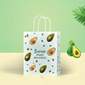 White kraft paper shopping bag featuring green avocado prints and white rope handles - Avocado; Vertical Medium Size 21*11*27