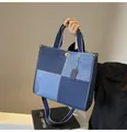 Blue denim patchwork tote bag with gold twist lock and adjustable shoulder strap - Blue