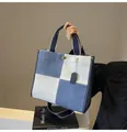 Blue denim and white canvas tote bag with adjustable strap and metal buckle - White