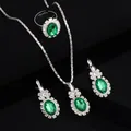 Elegant silver jewelry set featuring oval green gemstone necklace, earrings and ring - Three-Piece Set / 8412 Green