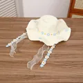 Cream straw sun hat featuring blue floral appliques and sheer organza ribbons - Blue/White Flower - Creamy White