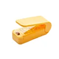 Portable mini bag sealer in bright yellow ABS plastic with safety guard feature - Chinese Packaging / Yellow