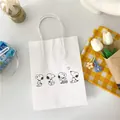 Cute white paper gift bag with cartoon Snoopy dog illustrations and white rope handles - Cartoon Dog