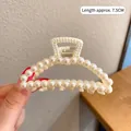 Elegant 7.5cm metal claw clip with white faux pearls in a sleek semi-circular design - Artificial Pearl Moon Claw Clip (15#)