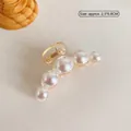 Large hair claw clip with gradient pearls and metal spring on beige background - Medium Artificial Pearl Claw Clip (32#)