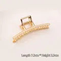 Polished gold metal hair claw clip with spring grip, measuring 7.3cm long and 2.3cm high - Medium Bar Claw Clip (65#)