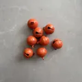 Set of 8 bright orange 14mm painted metal bells with hanging holes and slit design - Rolling Spray Deep Orange / 14mm