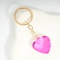 Pink heart faceted acrylic keychain with golden metal chain on a white background - Sample Rose Red / Gold