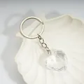 Sweet heart-shaped acrylic crystal keychain with a clear multifaceted pendant and silver ring - Clear White / Silver