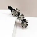 Elegant flower banana hair clip featuring sparkling crystals on a black base - Gray