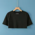 Black crop top thermal shoulder wrap in breathable fabric blend on wooden hanger - M / T-Shirts / Black