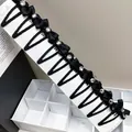 Set of twelve black satin bow hair clips with shiny rhinestones on display card - Crystal Waterdrop Clip Bow