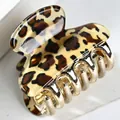 Fashionable leopard print hair claw clip with golden metal base for stylish hairstyling - Classic Dark Small Leopard Print