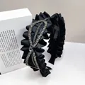 Elegant black satin pleated headband with sparkling rhinestone centerpiece accent - Bow Crystal-Black