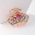 Crown shaped hair claw clip featuring multi-color rhinestones in rose gold finish - Multicolor Crown Style