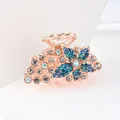 Sparkling blue rhinestone flower hair claw clip with golden alloy finish for women - Flower Blue