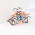 Elegant rose gold hair claw clip featuring blue and white rhinestones with heart design - Blue Crown