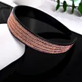 Funkelndes mehrreihiges Haarband mit champagnerfarbenen und lila Kristallen in Schwarz - Champagner & Lila Strass