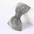 Close-up of a luxury bow hair clip with full rhinestones and leopard leopard print base - White Zircon