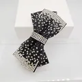 Elegante pasador de pelo con lazo de diamantes de imitación negros y plateados brillantes - Cruz Mediana Degradado Blanco y Negro