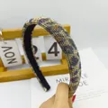 Diadema de moda con estampado de leopardo y brillantes cristales dorados y morados - Leopardo Dorado