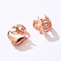 Detailed view of rose gold swan hair claw clips with colorful rhinestone accents - Swan Shape