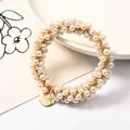 Elegant pearl beaded hair scrunchie with a round gold metal tag for women - Small Pearl Loop With Pendant (Pearl White)