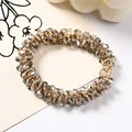 Champagne crystal beaded hair tie with multi-faceted diamond cut for elegant ponytail styling - Crystal Loop (Transparent Gray)