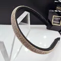 Cerchietto imbottito con strass argento scintillanti e base in spugna nera spessa - Champagne