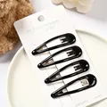 Juego de cuatro pinzas para el pelo negras con forma de gota y acabado brillante - Negro Brillante