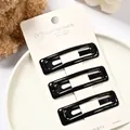 Set de tres pinzas para el cabello rectangulares negras brillantes en tarjeta - Cuadrado Negro Brillante