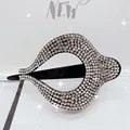 Close-up of sparkling full rhinestone hollow teardrop hair clip with elegant silver crystals - White Rhinestone