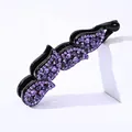 Macro detail of high-quality purple rhinestone hair clip with banana vertical clip design - Purple Rhinestone