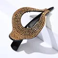 Sparkling champagne gold rhinestone hair claw clip with cutout design on black base - Champagne Rhinestone
