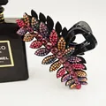 Sparkly leaf-shaped hair claw clip with colorful rhinestones in a purple pink gradient finish - Colorful