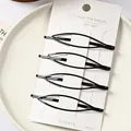 Juego de cuatro pinzas metálicas negras brillantes en tarjeta blanca para el cabello - Estilo Hueco Ovalado