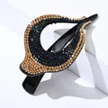 Elegante pinza para el pelo con pedrería en azul oscuro y champán sobre base negra - Strass Champaña y Azul Marino