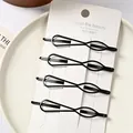 Set de 4 clips para el cabello de metal negro mate en tarjeta blanca para peinado mujer - Estilo Forma de Pipa Hueco
