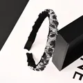 Diadema de diamantes de imitación con estampado de leopardo y base de tela plisada negra - Estilo Leopardo Strass Blanco