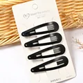 Set de cuatro pinzas para el cabello BB de metal negro mate en tarjeta blanca - Estilo Pequeña Gota de Agua Mate Premium