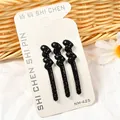 Set de tres pinzas para el cabello onduladas con diamantes negros en tarjeta blanca - Estilo Doble Corazón (NM-425) / Juego de 3 / Negro