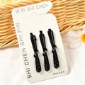 Set de 3 pinzas para el pelo con lazo negro y cristales brillantes en tarjeta - Estilo Lazo en la Cintura (NM-425) / Juego de 3 / Negro