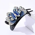 Close-up of elegant double-layered butterfly hair claw with blue and silver rhinestones - Blue Rhinestone