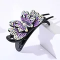 Elegant double-layered butterfly hair claw with purple rhinestones on a white stand - Light Purple