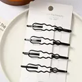 Set de 4 pinzas para el cabello onduladas de metal negro en tarjeta para mujer - Horquilla de Alambre (Ondulada) / Paquete de 4 / Negro
