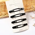 Set de 4 clips para el cabello negro mate en forma de gota sobre cartulina - Pinza Clic-Clac Mate 7cm (NM-6621) / Paquete de 4 / Negro